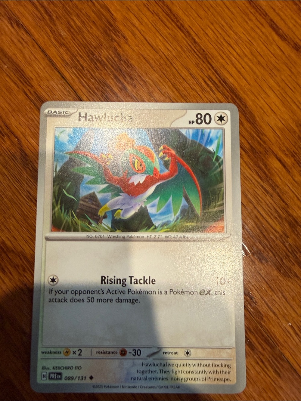 Pokemon Hawlucha Trading Card - red, green, blue